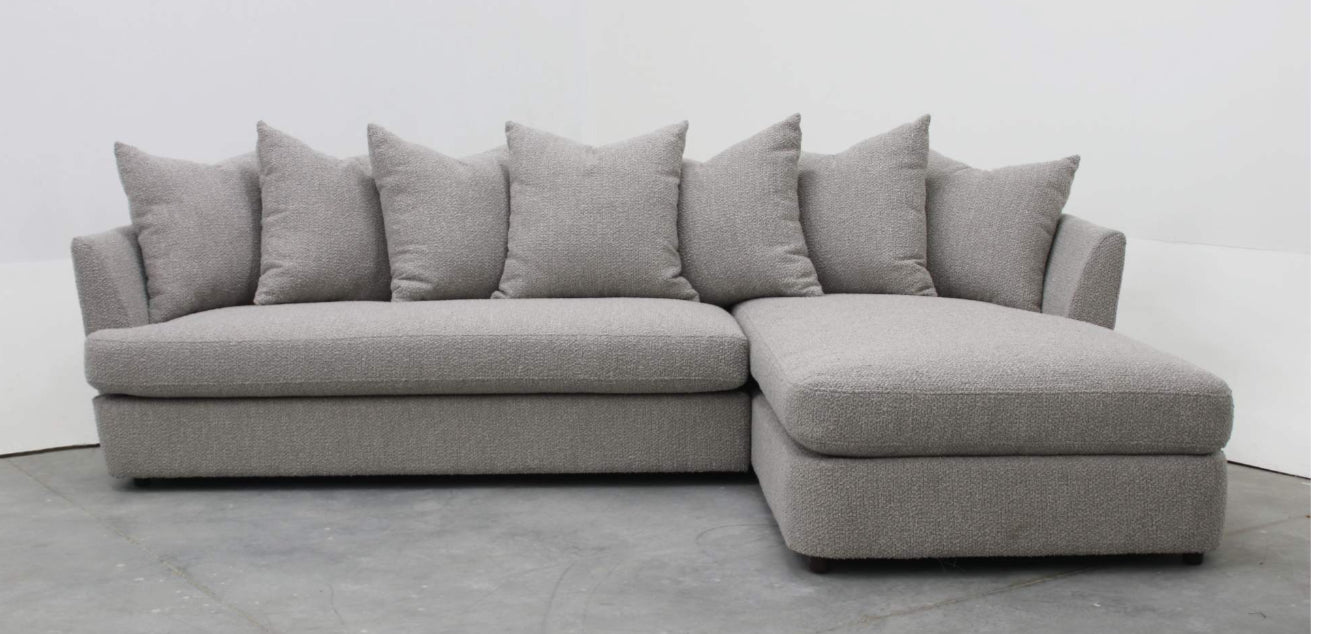 Sofa con chaise en tela bucle