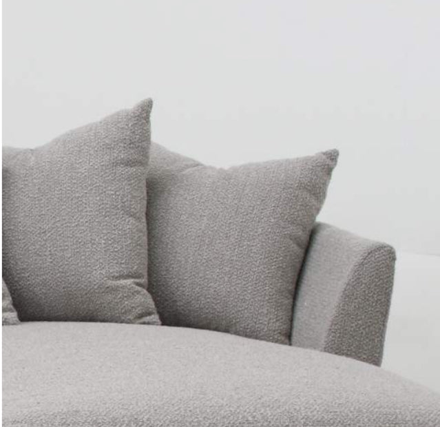 Sofa con chaise en tela bucle